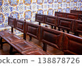 Rows of Wooden Benches in a Historical Interior with Azulejo Tiled Walls 138878726
