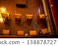 Traditional Wooden Chairs in a Warmly Lit Interior 138878727