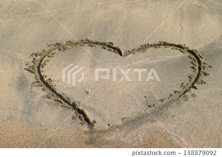 Heart drawn on the beach sand Heart drawn on the beach sand 138879092