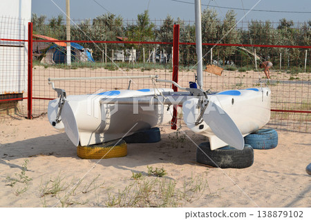 Catamaran on the beach 138879102