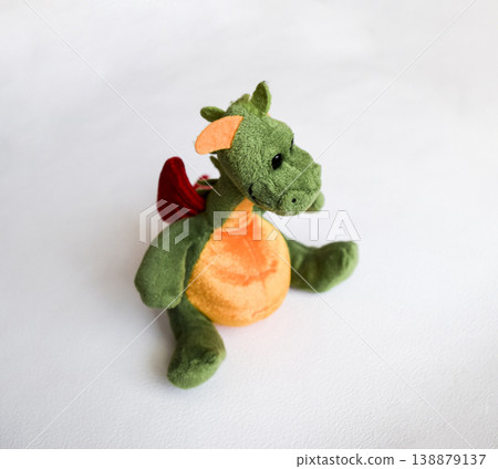 Stitched soft toy fabric on a white background. Animal toy. Stitched soft toy fabric on a white background. Animal toy. 138879137