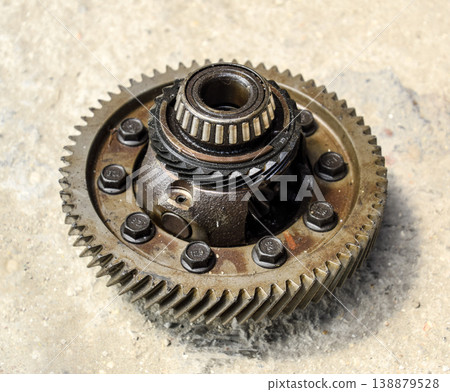 Dismantled box car transmissions. Gear with bearings. The gears on the shaft of a mechanical transmission. Dismantled box car transmissions. Gear with bearings. The gears on the shaft of a mechanical transmission. 138879528