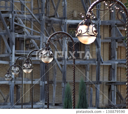 Street lights on the background of scaffolding Street lights on the background of scaffolding 138879590