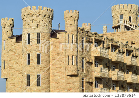 The hotel building, covered with decorative stone 138879614