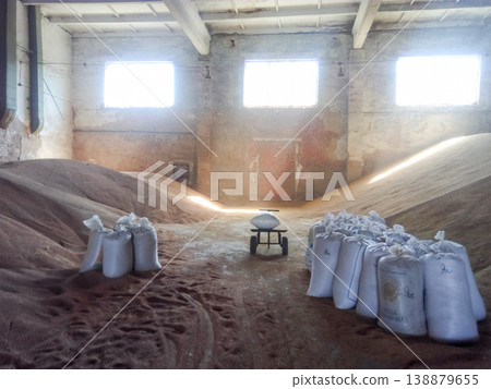 Heap of grains of barley and wheat in stock Heap of grains of barley and wheat in stock 138879655