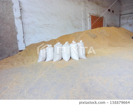 Heap of grains of barley and wheat in stock Heap of grains of barley and wheat in stock 138879664