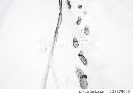 Human footprints in the snow. The path in the snow 138879690
