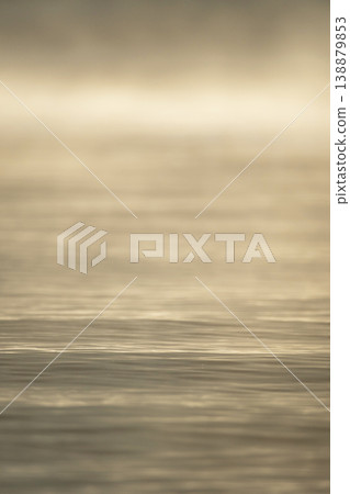 The surface of the water, shrouded in morning mist, at Togo Pond. The surface of the water, shrouded in morning mist, at Togo Pond. 138879853