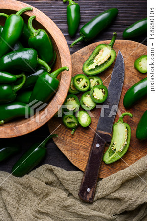 Top view of jalapeno peppers with chopped slices Top view of jalapeno peppers with chopped slices 138880103