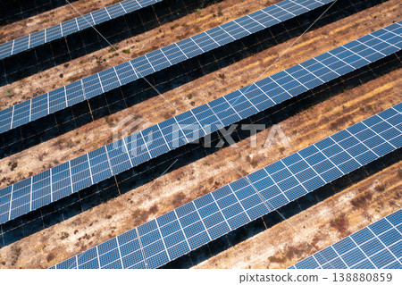Aerial view of solar panels arranged in rows on Aerial view of solar panels arranged in rows on 138880859