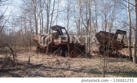 Two Rusting Tractors Abandoned In Field, Cabs Collapsed And Metal Skins Flaking, Birch Saplings Poking 138881253