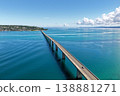 Aerial view of Kouri Bridge and the emerald green sea in Okinawa. 138881271