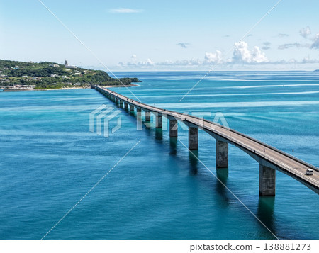 Aerial view of Kouri Bridge and the emerald green sea in Okinawa. 138881273