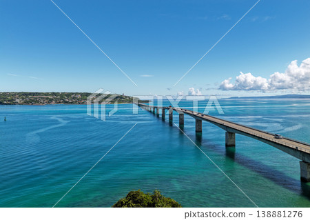 Aerial view of Kouri Bridge and the emerald green sea in Okinawa. 138881276