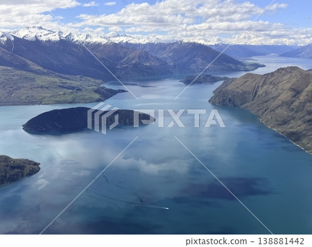 Islands and mountain ranges of Lake Wanaka from an airplane Islands and mountain ranges of Lake Wanaka from an airplane 138881442