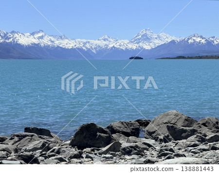Mount Cook and the rocky shores of Lake Pukaki Mount Cook and the rocky shores of Lake Pukaki 138881443