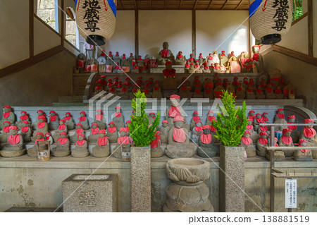 Kyoto, Japan - Oct 11 2025, Panoramic view of hall filled with stone statues of red scarves of god Jizo, the patron saint of small children, at Kiyomizu dera Temple, at daytime, Kyoto, Japan Kyoto, Japan - Oct 11 2025, Panoramic view of hall filled with stone statues of red scarves of god Jizo, the patron saint of small children, at Kiyomizu dera Temple, at daytime, Kyoto, Japan 138881519