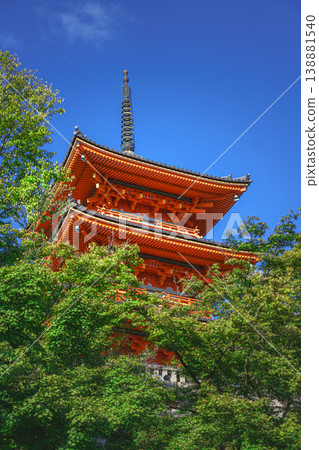 Kyoto, Japan - Oct 11 2024, panoramic view from below of the Kiyomizu-dera Temple pagoda peeking out from behind the treetops, without people, at daytime, Kyoto, Japan 138881540