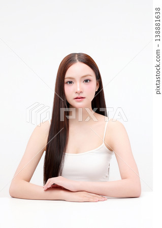 Portrait beautiful young Asian woman with K beauty style makeup and perfect skin on isolated white background. Facial and skin care concept for commercial advertising. Portrait beautiful young Asian woman with K beauty style makeup and perfect skin on isolated white background. Facial and skin care concept for commercial advertising. 138881638