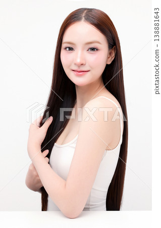 Portrait beautiful young Asian woman with K beauty style makeup and perfect skin on isolated white background. Facial and skin care concept for commercial advertising. Portrait beautiful young Asian woman with K beauty style makeup and perfect skin on isolated white background. Facial and skin care concept for commercial advertising. 138881643