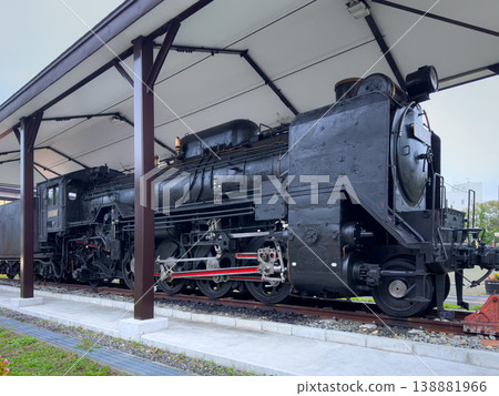 Muroran, Hokkaido, Japan - Oct 4 2024, panoramic view of an old train locomotive standing as an exhibit near by Muroran Former station information center, at daytime, without people, Muroran, Japan Muroran, Hokkaido, Japan - Oct 4 2024, panoramic view of an old train locomotive standing as an exhibit near by Muroran Former station information center, at daytime, without people, Muroran, Japan 138881966