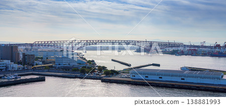 Osaka, Japan - Oct 11 2024, Panoramic view of the Minato Highway Bridge over Osaka Bay, with the port's cruise terminal and marina in the foreground, at daytime, Osaka, Japan Osaka, Japan - Oct 11 2024, Panoramic view of the Minato Highway Bridge over Osaka Bay, with the port's cruise terminal and marina in the foreground, at daytime, Osaka, Japan 138881993