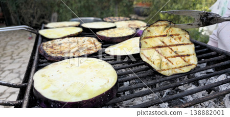 Close up view of Roasted eggplants on carbon barbecue 138882001
