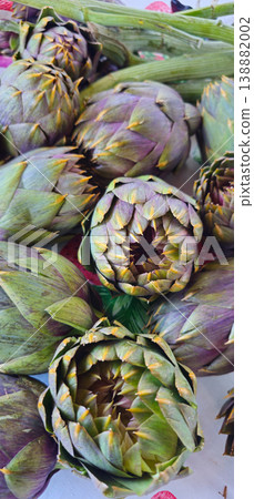 Close up view of Artichokes set up on table to be cooked 138882002