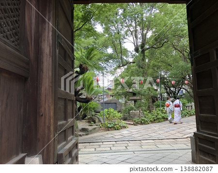 Women in traditional Japanese attire during the Kokura Gion Taiko festival and Yasaka Shrine Women in traditional Japanese attire during the Kokura Gion Taiko festival and Yasaka Shrine 138882087