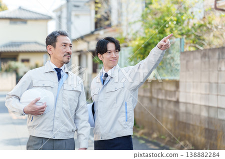 Workers conducting surveys outdoors Workers conducting surveys outdoors 138882284