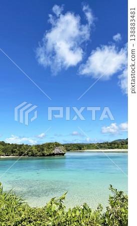 The breathtaking scenery of Kabira Bay in Ishigaki Island: Emerald green sea and blue sky, glass-bottom boat tour, Okinawa. 138883481