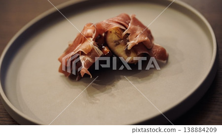 Sautéed prosciutto and figs Sautéed prosciutto and figs 138884209