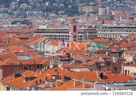 Red tiled rooftops and clock tower in Nice, France 138884328