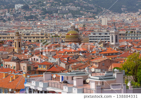 Red tiled rooftops and clock tower in Nice, France Red tiled rooftops and clock tower in Nice, France 138884331