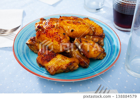 fried hot chicken wings on white plate for brunch fried hot chicken wings on white plate for brunch 138884579