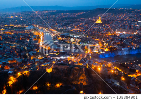 Aerial view of historical area of Tbilisi in evening lights Aerial view of historical area of Tbilisi in evening lights 138884901