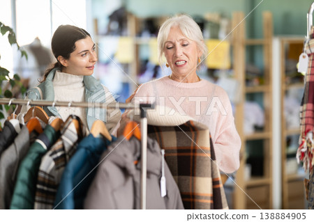 Regular customer mature woman and Armenian girl choose color and style of coat or jacket Regular customer mature woman and Armenian girl choose color and style of coat or jacket 138884905