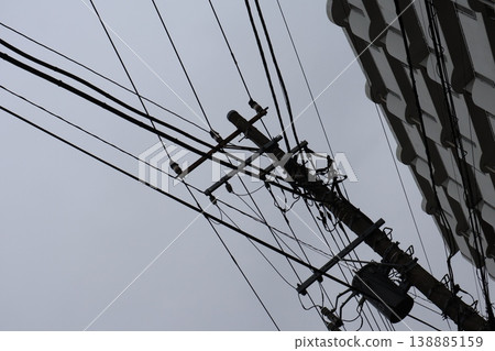 A utility pole and 3 A utility pole and 3 138885159
