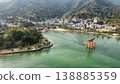 The torii gate of Itsukushima Shrine in the spring morning sun 138885359