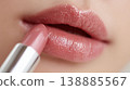 A delicate close-up image of lips smoothly layered with lipstick as part of a daily makeup routine. 138885567
