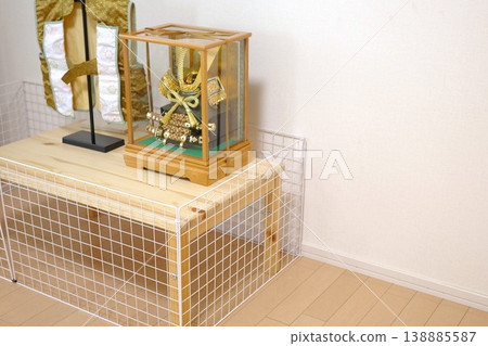 A handmade baby guard made from wire mesh purchased at a 100-yen store to surround the Boys' Festival dolls. A handmade baby guard made from wire mesh purchased at a 100-yen store to surround the Boys' Festival dolls. 138885587