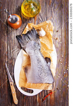 Pieces of fresh salmon on a table Pieces of fresh salmon on a table 138886876