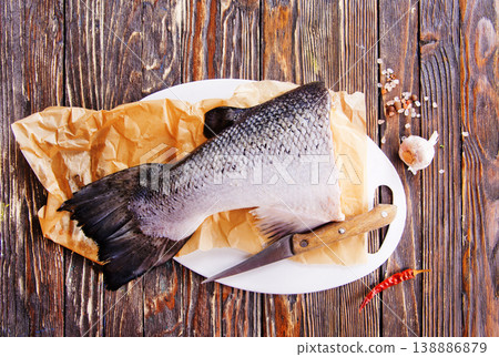 Pieces of fresh salmon on a table 138886879