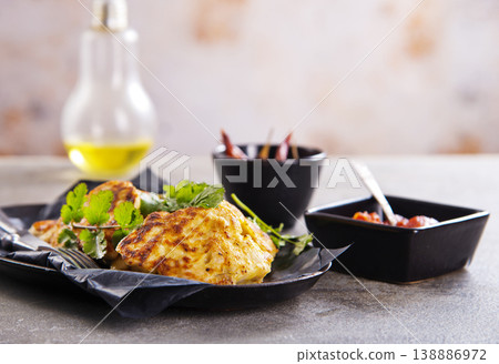 Chicken cutlets with fresh greens and sauce. Healthy home food for dieting. 138886972