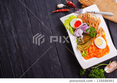 Buddha bowl with Chicken salad with egg and caviar 138886991