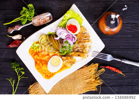 Buddha bowl with Chicken salad with egg and caviar 138886992