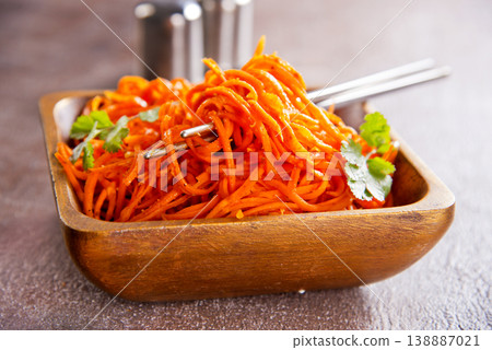 Carrot salad. French Grated Carrot Salad. Shredded carrot with garlic and black pepper Carrot salad. French Grated Carrot Salad. Shredded carrot with garlic and black pepper 138887021