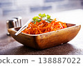 Carrot salad. French Grated Carrot Salad. Shredded carrot with garlic and black pepper 138887022