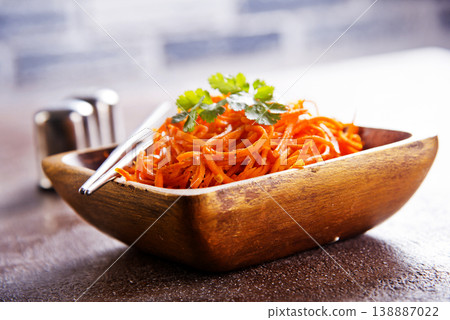 Carrot salad. French Grated Carrot Salad. Shredded carrot with garlic and black pepper Carrot salad. French Grated Carrot Salad. Shredded carrot with garlic and black pepper 138887022
