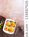 baked chicken cutlets in white bowl 138887026